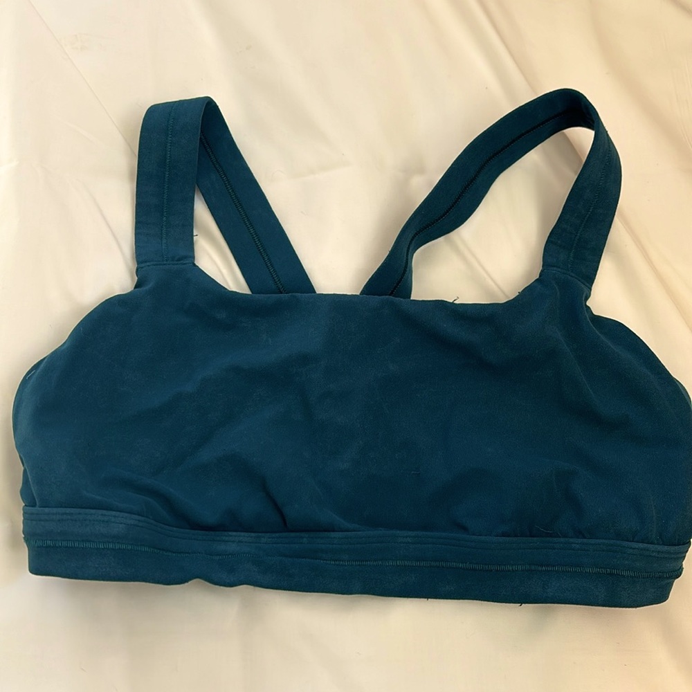 Green athlete sports bra